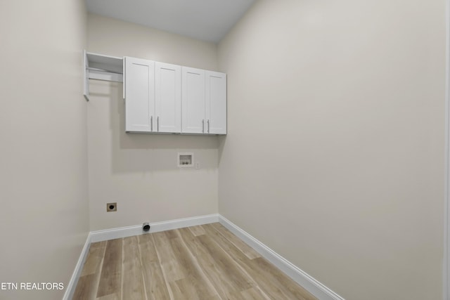 322 Fairway Dr, Dandridge, TN 37725 - laundry room featuring hookup for an electric dryer, baseboards, light wood-style flooring, washer hookup, and cabinet space