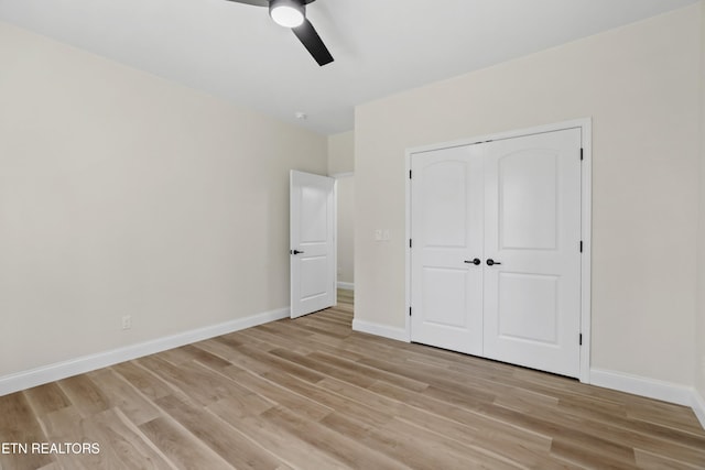 322 Fairway Dr, Dandridge, TN 37725 - unfurnished bedroom featuring light wood-style flooring, a closet, baseboards, and ceiling fan