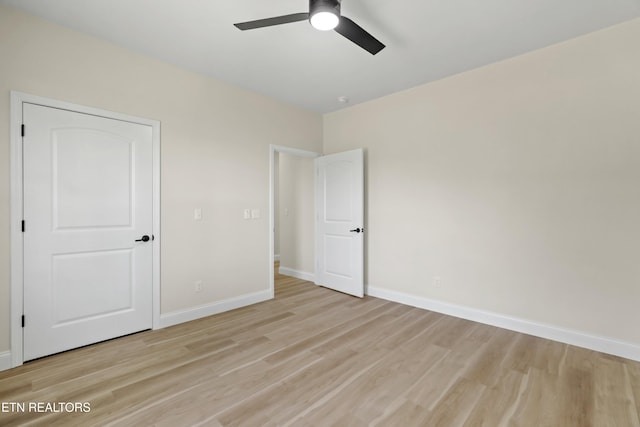322 Fairway Dr, Dandridge, TN 37725 - unfurnished bedroom with ceiling fan, light wood finished floors, and baseboards