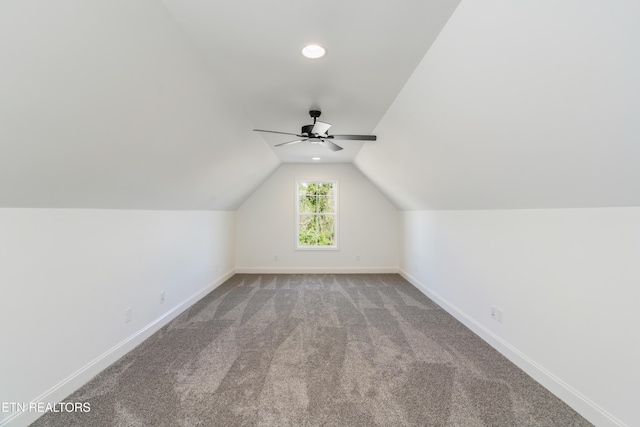bonus room featuring baseboards, ceiling fan, carpet floors, recessed lighting, and vaulted ceiling