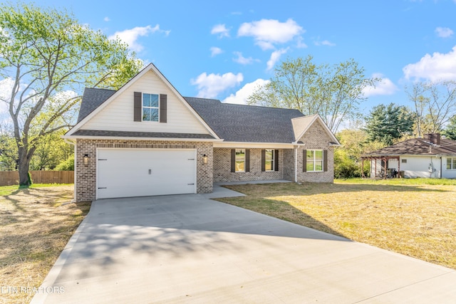 traditional home featuring fence, a front lawn, brick siding, a shingled roof, and driveway