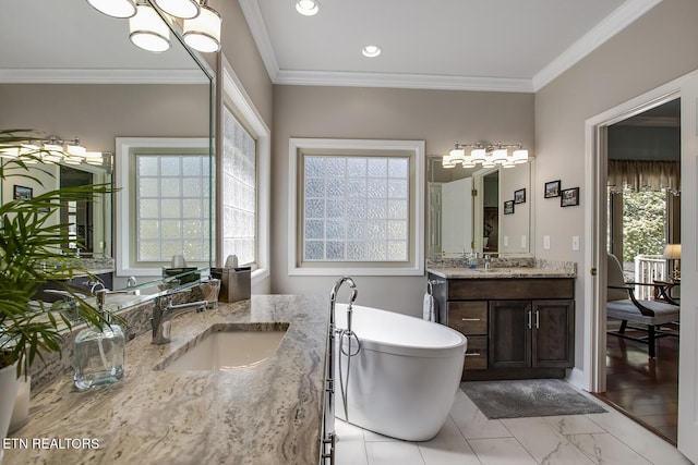 405 Tecumseh Pt, Loudon, TN 37774 - bathroom featuring a wealth of natural light, marble finish floor, a sink, and a freestanding bath