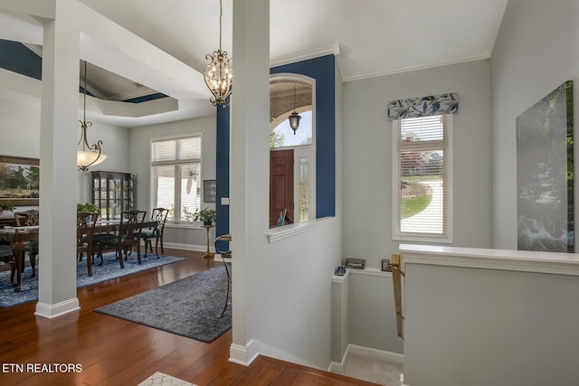 405 Tecumseh Pt, Loudon, TN 37774 - entrance foyer featuring ornamental molding, a chandelier, wood finished floors, and plenty of natural light