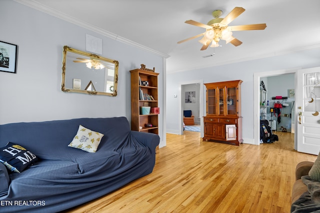 207 Loomis St, Tellico Plains, TN 37385 - living room featuring ceiling fan, baseboards, crown molding, and wood finished floors