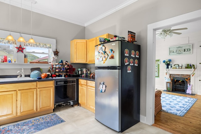 207 Loomis St, Tellico Plains, TN 37385 - kitchen with black dishwasher, a sink, ornamental molding, freestanding refrigerator, and light brown cabinetry