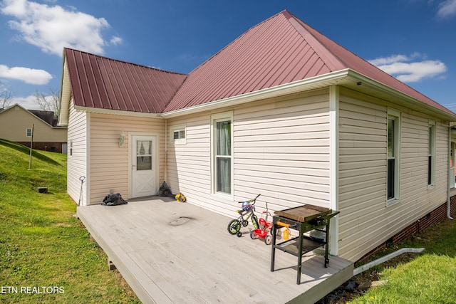 207 Loomis St, Tellico Plains, TN 37385 - back of house featuring a yard, metal roof, and a deck