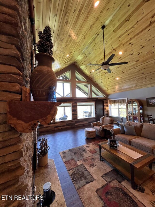 living area featuring wood-type flooring, ceiling fan, high vaulted ceiling, recessed lighting, and wooden ceiling