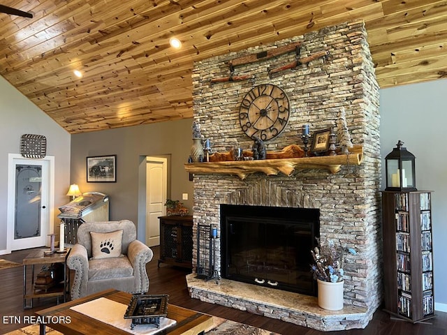 living room featuring wood ceiling, baseboards, a fireplace, and wood finished floors