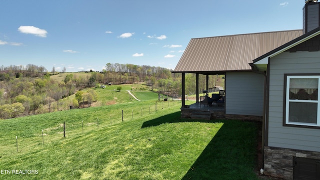 view of yard with a patio and fence