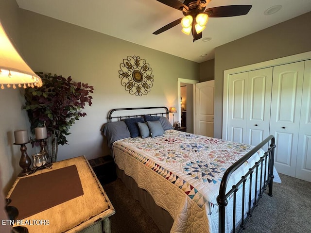 carpeted bedroom featuring a ceiling fan and a closet