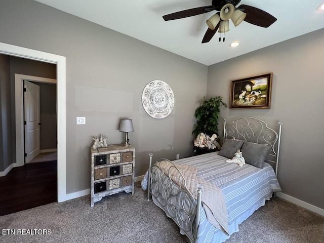 bedroom featuring carpet flooring, baseboards, and ceiling fan