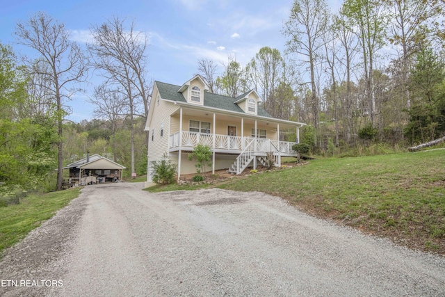211 Peanut Ln, New Tazewell, TN 37825 - view of front of house with covered porch, stairs, an outbuilding, a front lawn, and driveway