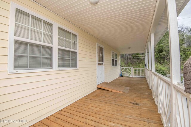 211 Peanut Ln, New Tazewell, TN 37825 - wooden terrace featuring covered porch