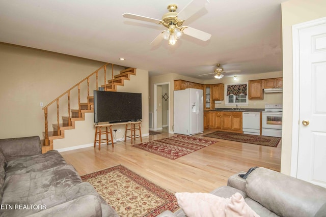 211 Peanut Ln, New Tazewell, TN 37825 - living area with baseboards, ceiling fan, recessed lighting, light wood finished floors, and stairway