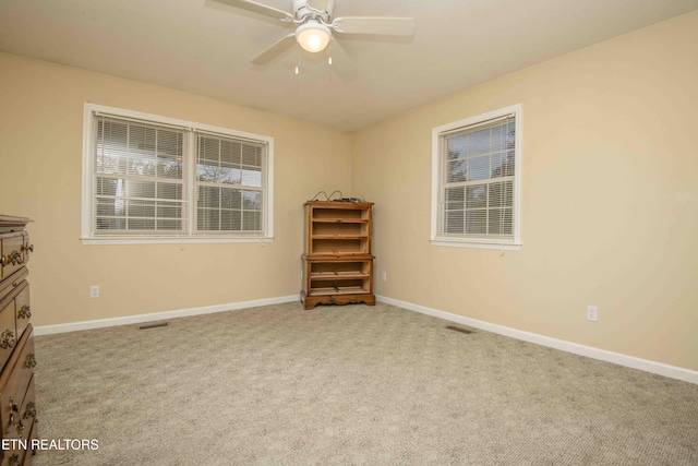 211 Peanut Ln, New Tazewell, TN 37825 - carpeted spare room featuring baseboards, a ceiling fan, and visible vents