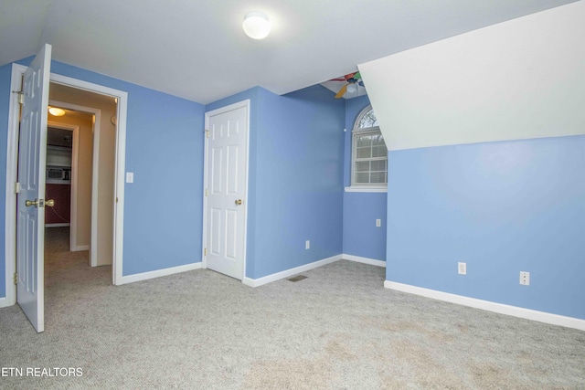 211 Peanut Ln, New Tazewell, TN 37825 - bonus room featuring visible vents, baseboards, carpet, and vaulted ceiling