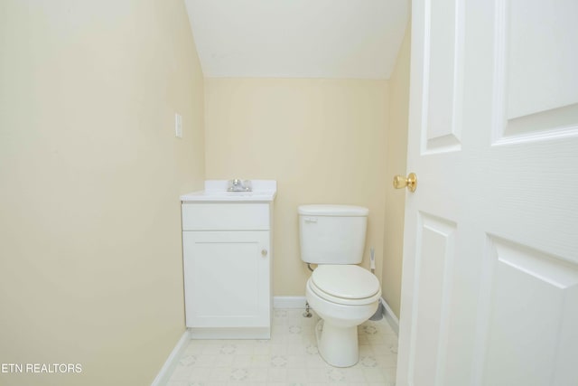 211 Peanut Ln, New Tazewell, TN 37825 - half bathroom featuring vanity, baseboards, and toilet