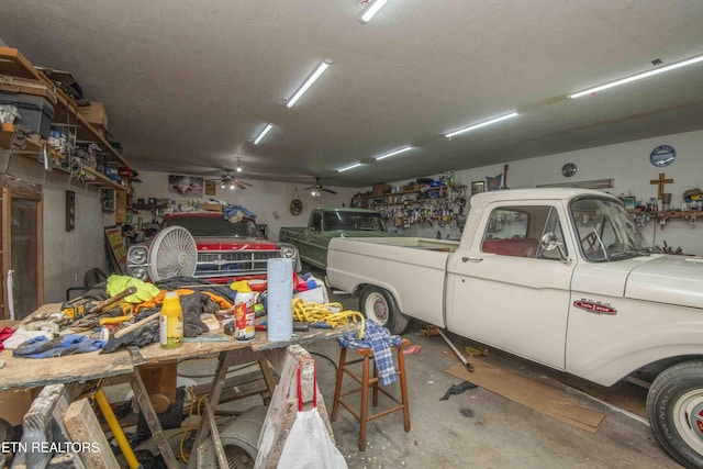 211 Peanut Ln, New Tazewell, TN 37825 - garage featuring a workshop area