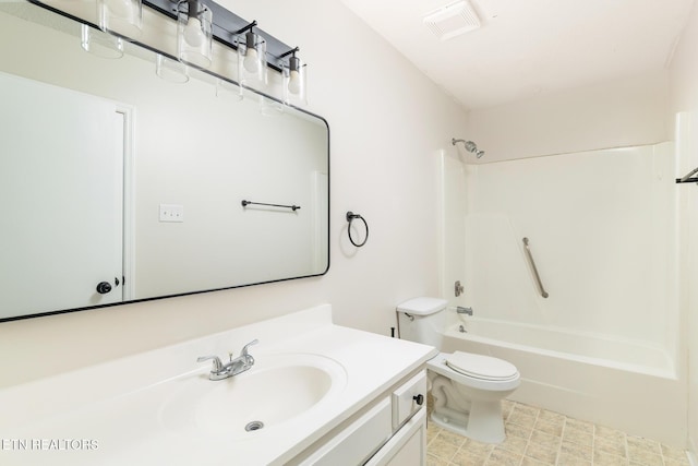 full bathroom featuring toilet, visible vents, vanity, and washtub / shower combination