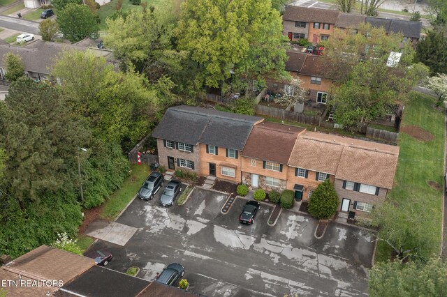 birds eye view of property with a residential view