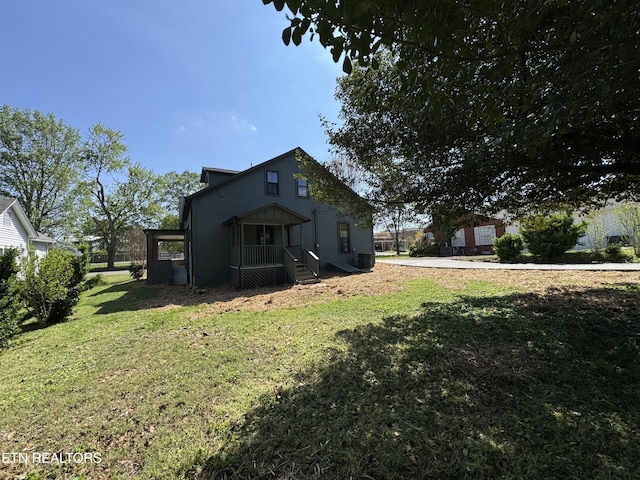 304 Broad St, Sweetwater, TN 37874 - back of house featuring a lawn