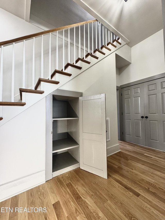 304 Broad St, Sweetwater, TN 37874 - stairway with visible vents, baseboards, and wood finished floors