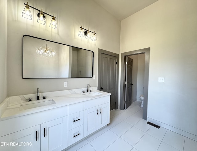 304 Broad St, Sweetwater, TN 37874 - full bathroom featuring double vanity, visible vents, a sink, and toilet