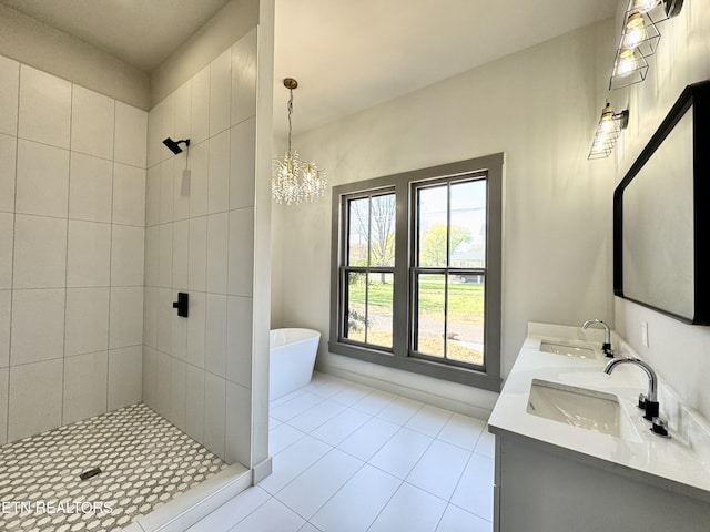 304 Broad St, Sweetwater, TN 37874 - bathroom with tile patterned floors, tiled shower, double vanity, and a sink