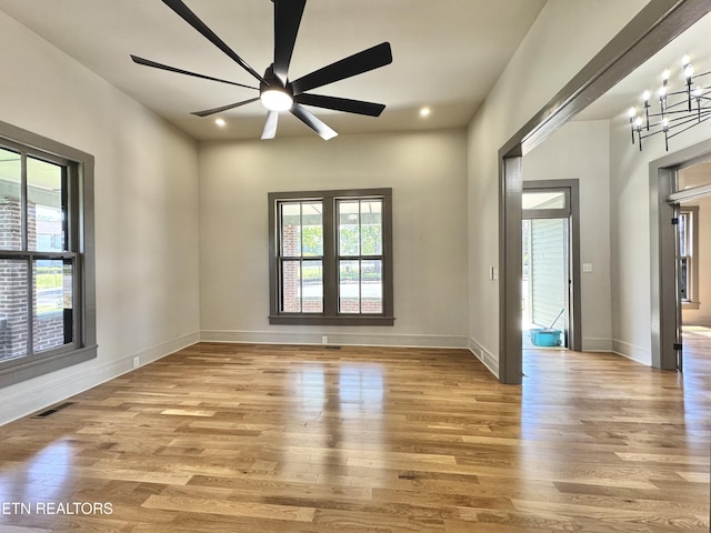 304 Broad St, Sweetwater, TN 37874 - spare room with ceiling fan, baseboards, wood finished floors, and a healthy amount of sunlight