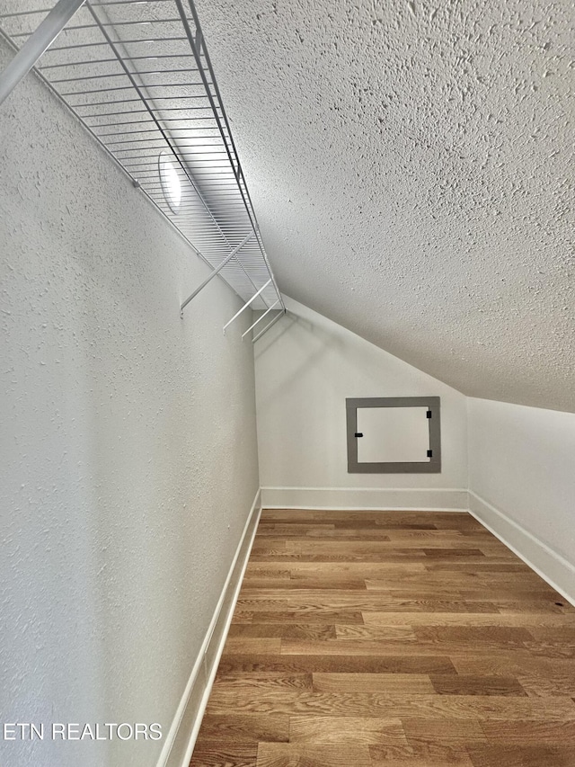 304 Broad St, Sweetwater, TN 37874 - spacious closet featuring wood finished floors and lofted ceiling