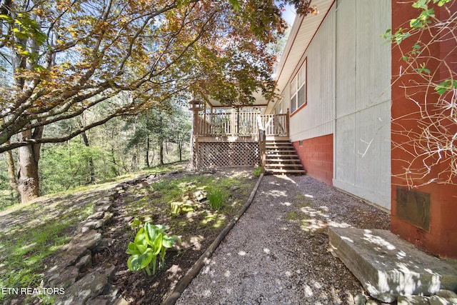 1615 Upper Middle Creek Rd, Sevierville, TN 37876 - view of side of home featuring crawl space, a deck, and stairway