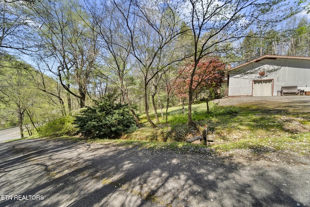 1615 Upper Middle Creek Rd, Sevierville, TN 37876 - view of yard featuring a pole building and an outdoor structure