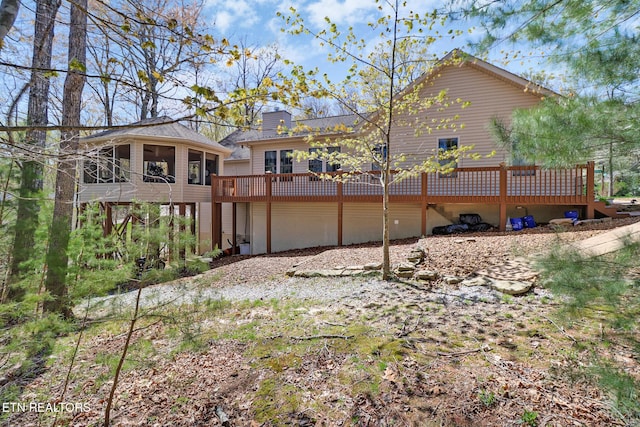 10 Claremont Cir, Fairfield Glade, TN 38558 - rear view of property with a wooden deck and a chimney