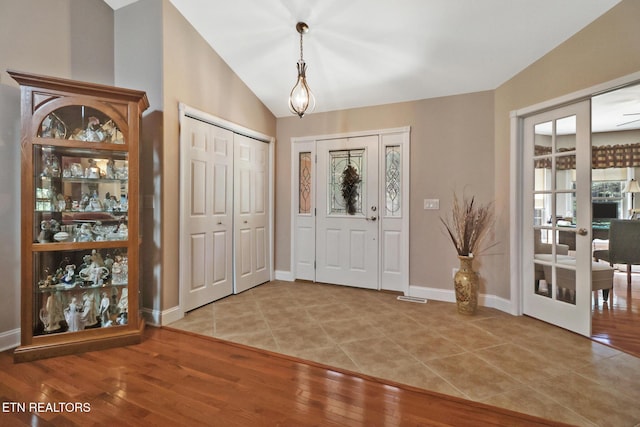 10 Claremont Cir, Fairfield Glade, TN 38558 - tiled foyer entrance featuring vaulted ceiling and baseboards