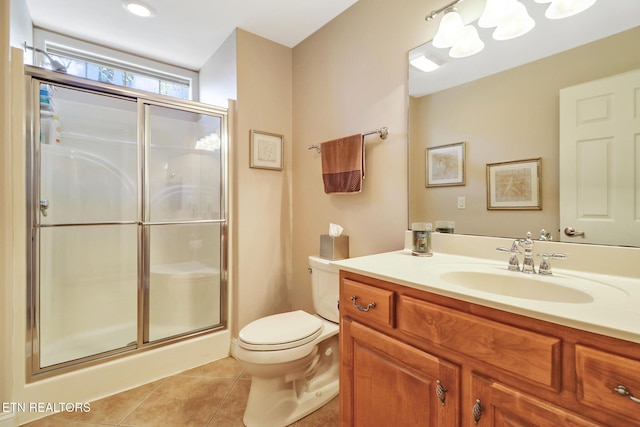 10 Claremont Cir, Fairfield Glade, TN 38558 - full bathroom with a shower stall, tile patterned floors, vanity, and toilet