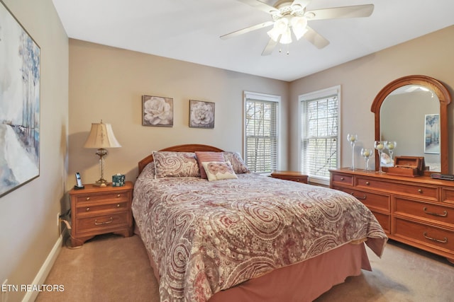 10 Claremont Cir, Fairfield Glade, TN 38558 - bedroom with baseboards, a ceiling fan, and light colored carpet