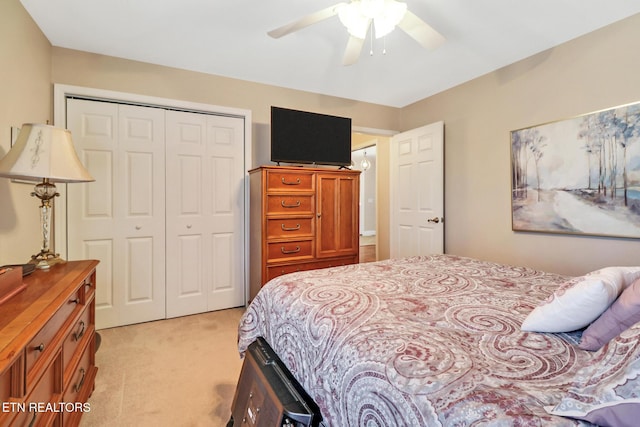 10 Claremont Cir, Fairfield Glade, TN 38558 - bedroom with light colored carpet, a ceiling fan, and a closet