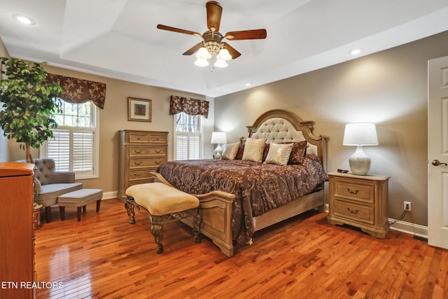10 Claremont Cir, Fairfield Glade, TN 38558 - bedroom with recessed lighting, light wood finished floors, a raised ceiling, baseboards, and ceiling fan