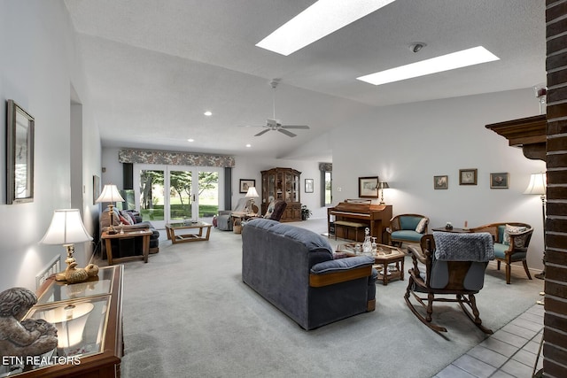 212 Tooweka Ln, Loudon, TN 37774 - living area with a skylight, vaulted ceiling, carpet, and ceiling fan