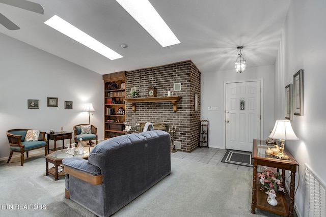 212 Tooweka Ln, Loudon, TN 37774 - living room featuring light colored carpet, a skylight, vaulted ceiling, baseboards, and built in features
