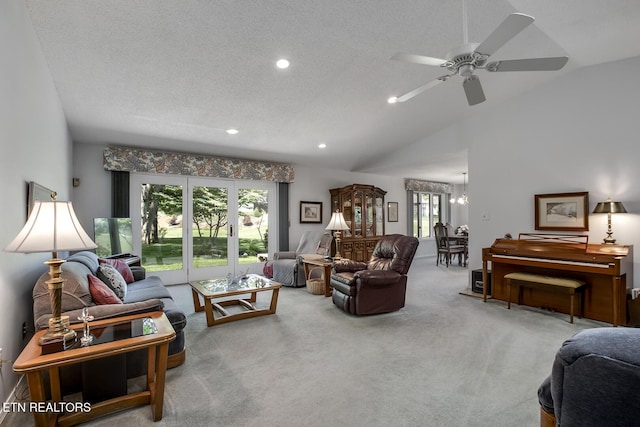 212 Tooweka Ln, Loudon, TN 37774 - carpeted living room featuring plenty of natural light, recessed lighting, ceiling fan, vaulted ceiling, and a textured ceiling