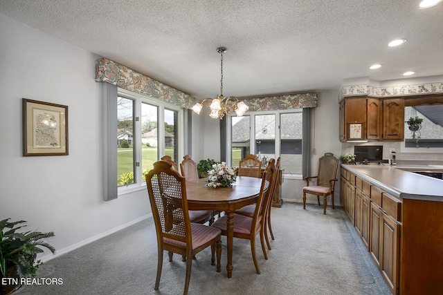 212 Tooweka Ln, Loudon, TN 37774 - dining room featuring a chandelier, light carpet, baseboards, a textured ceiling, and recessed lighting
