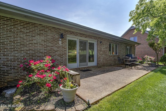 212 Tooweka Ln, Loudon, TN 37774 - rear view of property featuring a patio area and brick siding
