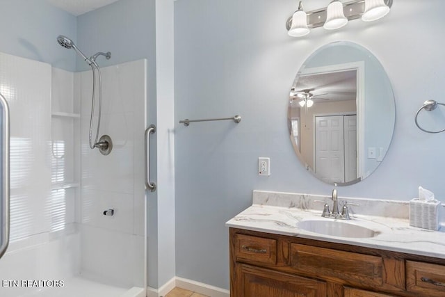 full bathroom featuring vanity, walk in shower, and ceiling fan