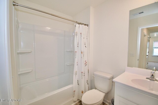 2141 Glen Crk, Knoxville, TN 37924 - full bath featuring visible vents, toilet, vanity, and shower / bath combination with curtain