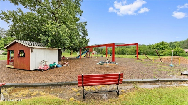 419 Mountain Thrush Dr, Townsend, TN 37882 - community play area featuring a shed and an outbuilding