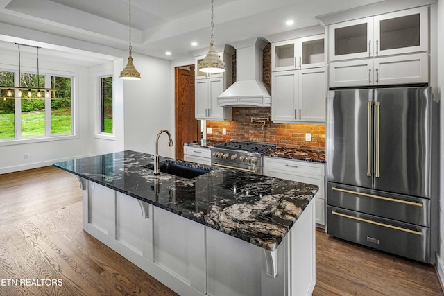 4537 Old Walland Hwy, Walland, TN 37886 - kitchen with wall chimney exhaust hood, recessed lighting, appliances with stainless steel finishes, dark wood-style flooring, and a sink