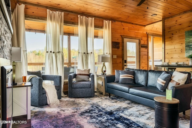 4164 Chamberlain Ln, Sevierville, TN 37862 - living room featuring wood ceiling and wooden walls