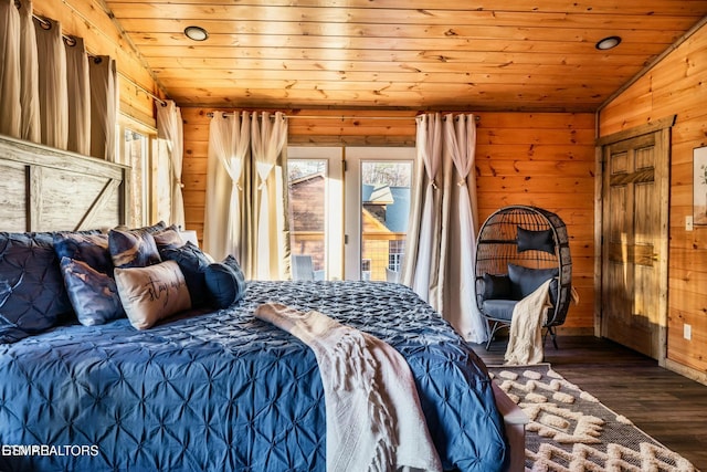 4164 Chamberlain Ln, Sevierville, TN 37862 - bedroom with wood walls, wood ceiling, dark wood-style floors, and lofted ceiling