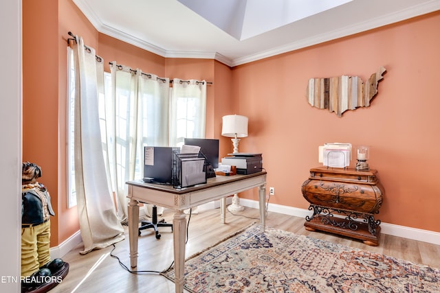 home office with ornamental molding, baseboards, and wood finished floors